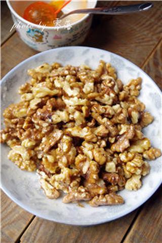 Honey Glazed California Walnuts step 6: Remove the walnuts from the microwave, add the honey-butter mixture, and toss un