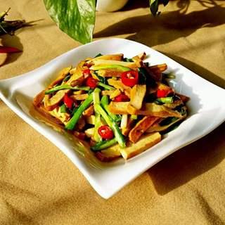 Stir-Fried Dried Tofu with Green Onions and Chili step 10: Transfer to a serving plate and serve hot.