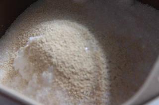 Soft Milk Sandwich Bread Recipe step 2: Combine the bread flour, sugar, yeast, milk, eggs, and water in a large bowl. Mi