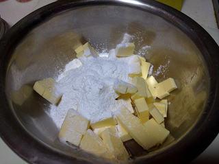 Chocolate Butter Cookies step 1: Add powdered sugar and salt to softened room-temperature butter.