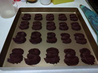 Chocolate Butter Cookies step 9: Pipe the dough into desired shapes on a lined baking tray.