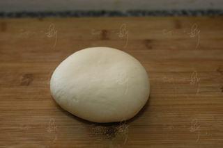 Steamed Milk Bread Rolls step 6: Punch down the dough to release trapped air, shape into a ball, cover, and let r