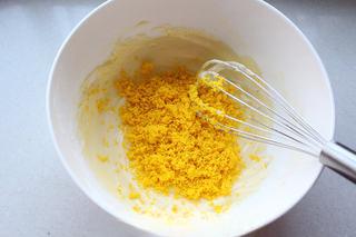 Melt-in-Your-Mouth Cornstarch Cookies step 5: Add the sifted egg yolk powder and mix until fully incorporated.