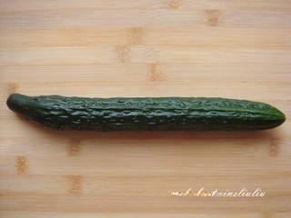 Sichuan Peppercorn Cucumber Salad step 1: Prepare a straight cucumber for the best presentation.