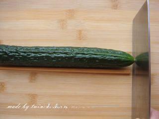 Sichuan Peppercorn Cucumber Salad step 8: Trim the cucumber and place a chopstick alongside it as a cutting guide.