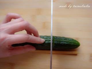 Sichuan Peppercorn Cucumber Salad step 9: Make thin vertical cuts across the cucumber, stopping at the chopstick so the cu