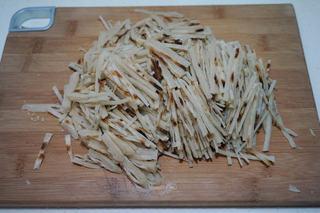 Stir-Fried Pancake Strips with Napa Cabbage step 5: Cut the pancakes into thin strips.