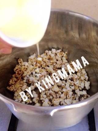 Creamy Caramel Popcorn step 6: Pour the hot cream caramel over the freshly popped popcorn and toss quickly unti