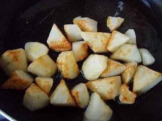 Candied Chinese Yam Recipe step 4: Fry until the yam is cooked through and lightly golden. Remove and drain.