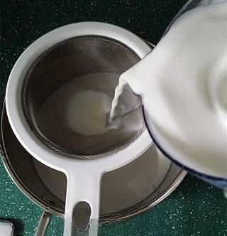 Savory Tofu Pudding step 5: Strain the soy milk through a fine mesh sieve or cheesecloth to remove solids.