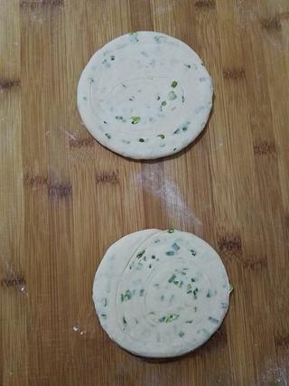 Whole Wheat Scallion Pancakes step 11: Roll each portion into a round pancake about 5–8 mm thick.