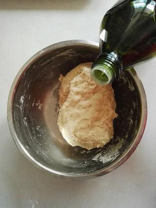 Whole Wheat Scallion Pancakes step 3: Add olive oil (or cooking oil if preferred) and continue mixing.