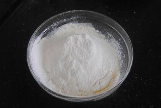Japanese Dorayaki Recipe step 6: Sift together the flour and baking powder, then gradually mix into the wet ingre