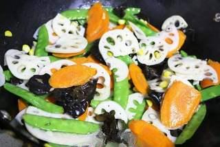 Quick Stir-Fried Mixed Vegetables step 6: Add all the blanched vegetables and stir-fry for 1 to 2 minutes. Season with sal