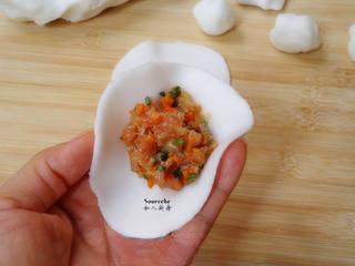 Crystal Shrimp Dumplings (Har Gow) step 8: Place a spoonful of filling in the center of each wrapper and fold into dumpling
