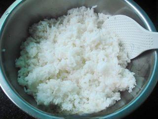 Grilled Eel Sushi Rolls step 1: Mix the cooled rice with salt, sushi vinegar, and sesame oil until evenly season