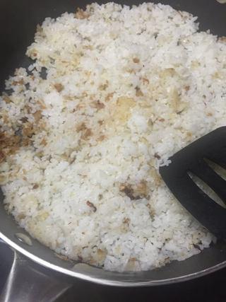 Leftover Fried Rice Recipe step 4: Add the cooked rice and stir-fry, breaking up any clumps.