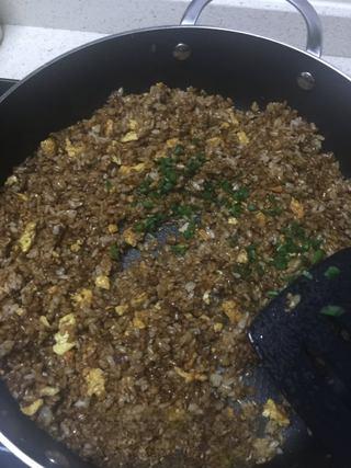 Leftover Fried Rice Recipe step 6: Return the scrambled eggs to the wok, add chopped scallions, season with salt to