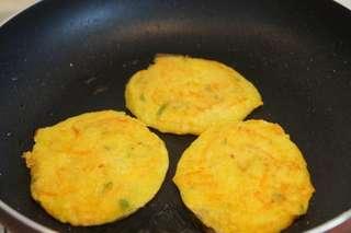 Soft Corn Pancakes step 10: Cook over medium-low heat until the bottom is golden brown. Flip and cook the ot
