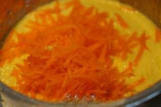 Soft Corn Pancakes step 5: Add the shredded carrot and corn kernels to the egg.