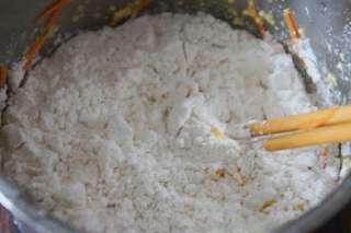 Soft Corn Pancakes step 6: Add the flour and mix until combined. If the batter is too thick, gradually add 