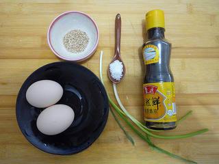 Aromatic Egg Pancake step 1: Prepare the eggs, scallions, soy sauce, sugar, sesame seeds, and cooking oil.