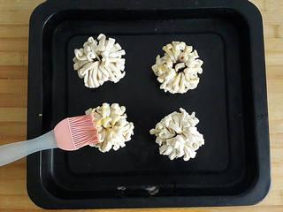 Red Bean Puff Pastry Recipe step 8: Place the pastries on a lined baking tray and brush lightly with egg wash.