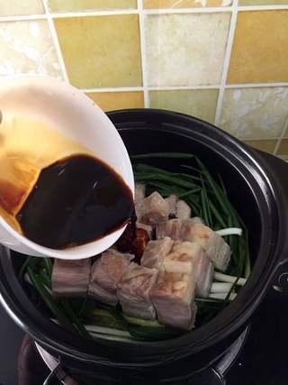 Clay Pot Braised Pork Belly Recipe step 7: Add the light soy sauce and dark soy sauce.
