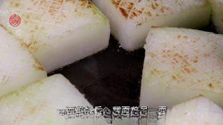 Braised Winter Melon with Minced Pork step 3: Heat a skillet over medium heat. Pan-fry the winter melon pieces until golden on