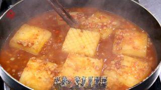 Braised Winter Melon with Minced Pork step 4: In the same pan, cook the diced pork belly until fragrant and lightly browned. A