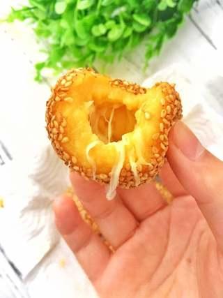 Cheese-Filled Sweet Potato Sesame Balls step 9: Serve warm and enjoy the melted cheese filling.