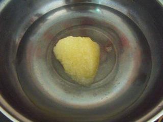 Sweet Lotus Seed Pudding step 7: Combine rock sugar and water in a saucepan. Heat until the sugar completely diss