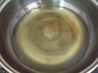 Sweet Lotus Seed Pudding step 8: Continue simmering the syrup until it thickens slightly and becomes glossy.