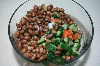 Peanut Cucumber Salad Recipe step 6: Combine the vegetables and cooled peanuts in a large bowl. Season with salt, soy