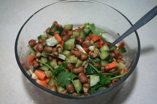 Peanut Cucumber Salad Recipe step 7: Add chopped cilantro and toss until evenly coated.