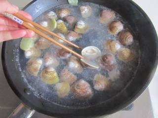 Steamed Egg Custard with Clams step 4: As soon as the clam shells open, remove them immediately and set aside.