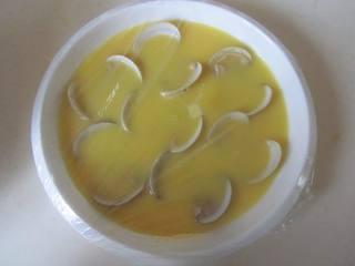 Steamed Egg Custard with Clams step 8: Cover the dish tightly with plastic wrap or a heatproof lid to prevent condensat