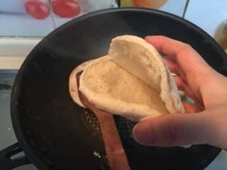 Pan-Fried Flatbread with Preserved Pork Recipe step 13: Slice each cooked flatbread open without cutting completely through.