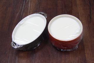 Double-Skin Milk Pudding with Red Beans step 9: Cover the bowl with plastic wrap and steam over gently boiling water for 15–20 m