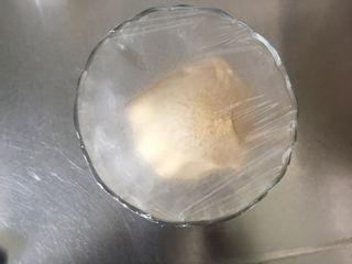 Whole Wheat Bread with Pork Floss Filling step 4: Cover the dough and place it in a warm area for the first rise.