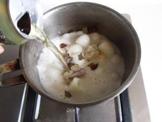 Beer-Braised Quail Eggs step 5: Pour in one can of beer.