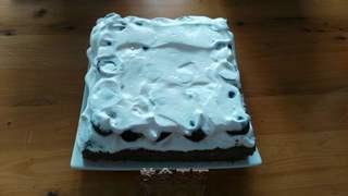 Black Forest Cake step 20: Add another layer of whipped cream.
