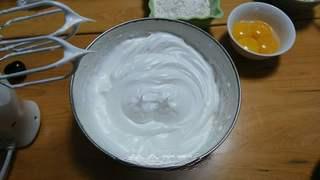 Black Forest Cake step 4: Continue beating while gradually adding the remaining sugar until stiff peaks fo