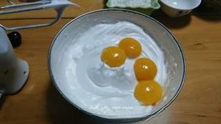 Black Forest Cake step 5: Add the egg yolks and continue beating until well combined.