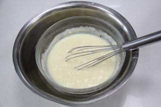 Japanese Cotton Cheesecake Recipe step 1: Separate the egg whites and yolks. Combine the cream cheese and milk in a heatpr