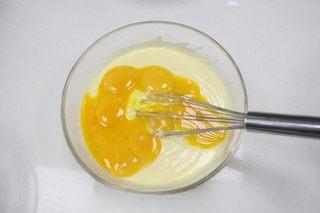 Japanese Cotton Cheesecake Recipe step 3: Add the egg yolks and mix until fully incorporated.