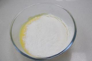 Japanese Cotton Cheesecake Recipe step 4: Combine the bread flour, cornstarch, and salt. Sift into the batter and mix unti