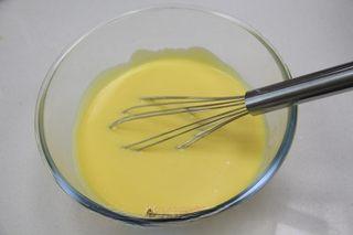 Japanese Cotton Cheesecake Recipe step 5: Strain the batter through a fine sieve for an extra-smooth texture.