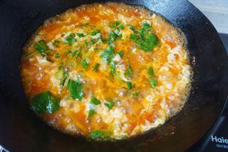 Tomato and Dough Drop Soup step 10: Beat the egg lightly and slowly drizzle it into the soup, stirring gently to cre