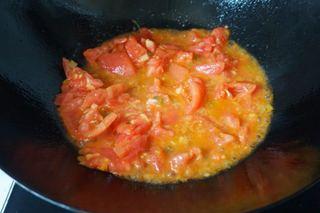 Tomato and Dough Drop Soup step 6: Add the tomatoes and cook until softened and juicy.
